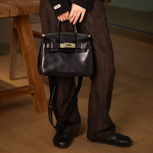 Pink Leather Handbag,Women's Leather Handbags,Pink Designer Bag,11.4in held by a person wearing stylish black clothes.