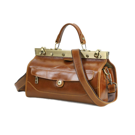 Genuine tan leather handbag for women with crossbody strap, stylish and functional design.