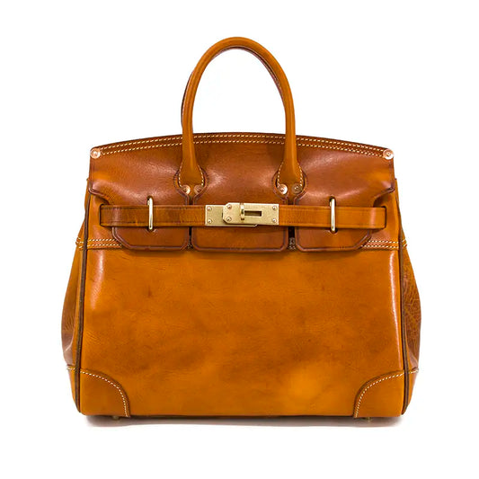 Leather Large Tote Bag in a rich tan color with sturdy handles and a secure clasp, showcasing quality craftsmanship.