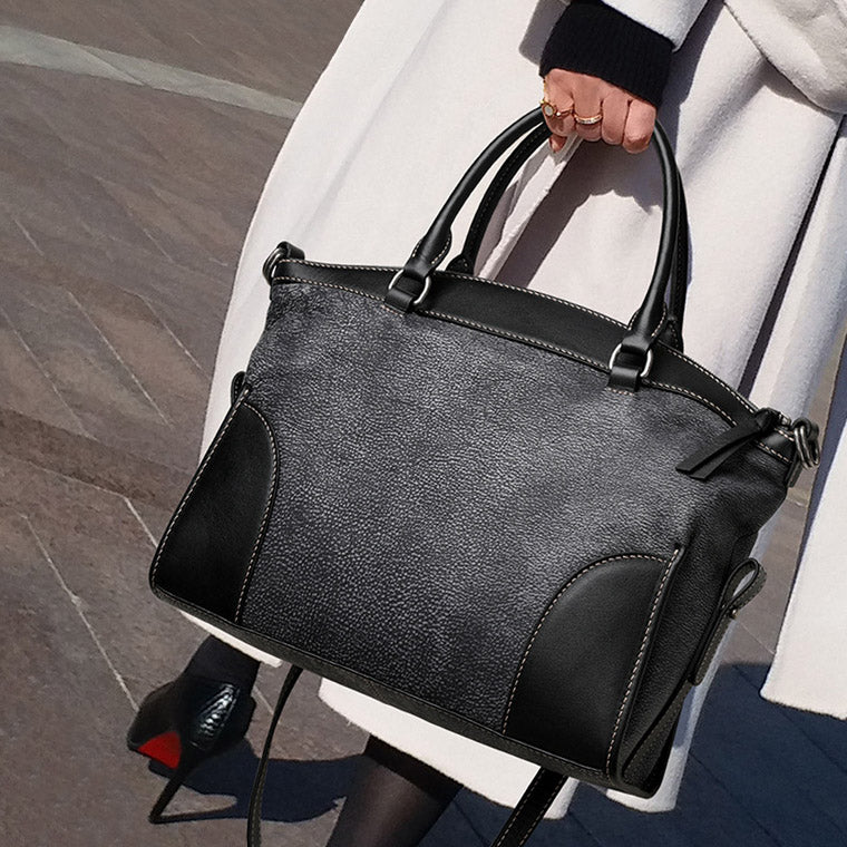 Dual Texture Leather Handbag Women 13.6in Shoulder Tote in black and gray, stylishly worn by model on the street.