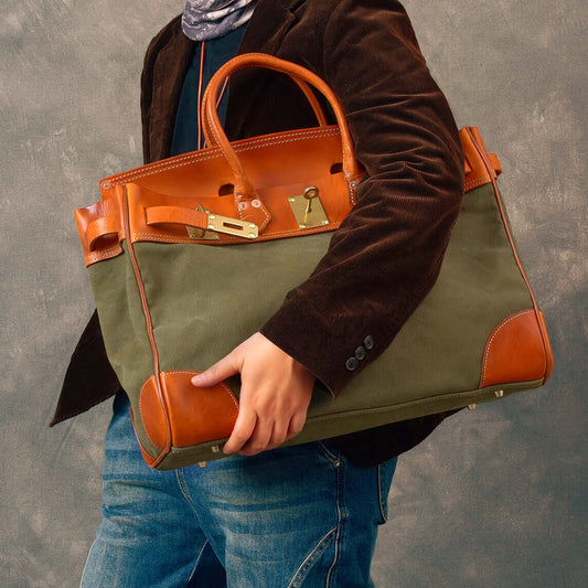 Large Canvas Leather Bag Travel Tote Italian Leather Work Bag 18.1in being carried by a model.