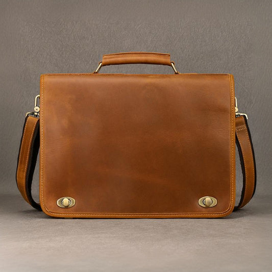 Vintage Leather Briefcase 15.4in Dual Compartment Bag For Men in yellow brown color with a shoulder strap.