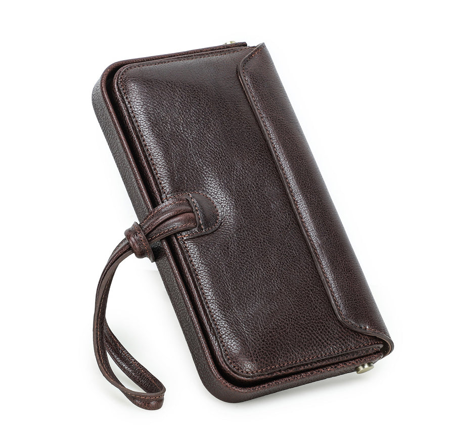 Leather Wristlet Wallet Women Clutch Metal Frame Phone Holder Purse in brown with wrist strap and textured finish.
