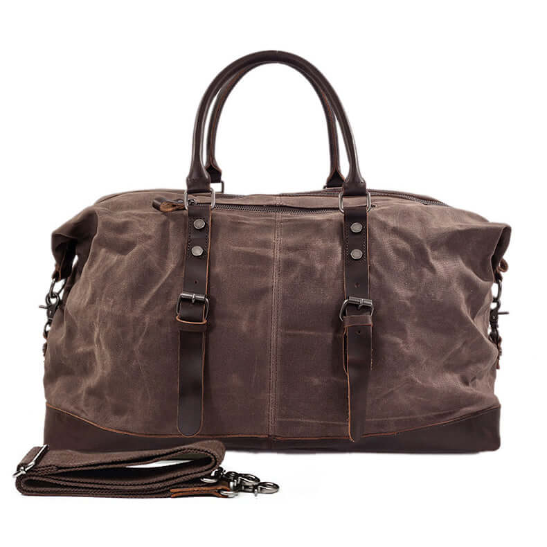 Large Waxed Canvas Travel Duffel Bag Leather Travel Duffle Luggage in dark brown with detachable shoulder strap.
