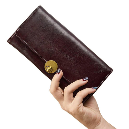 Leather Long Wallet Women Turn Lock Card Slots Phone Slot Purse in dark brown, held by hand, showcasing elegant design.