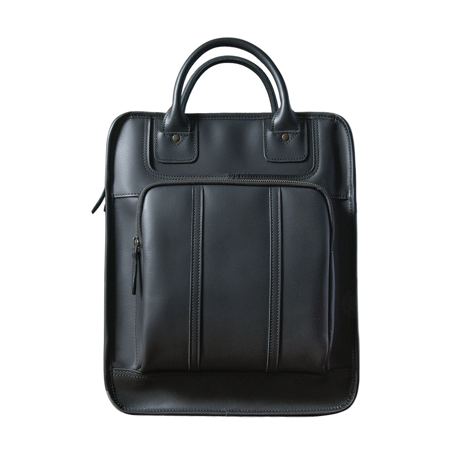 Stylish black leather laptop bag with dual handles and front zipper pocket, ideal for 15-inch laptops and professional use.