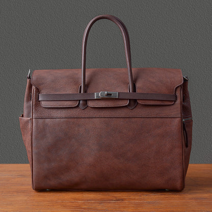 Mens leather business bag, 15-inch work tote in dark brown, featuring top handles and front buckle.