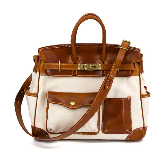 Large Canvas Tote featuring Italian genuine leather accents, perfect for travel with multiple pockets.