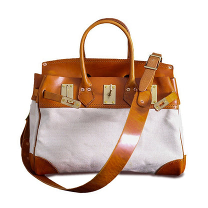 Canvas And Leather Handbags in tan leather and beige canvas, stylish work bag for unisex use.