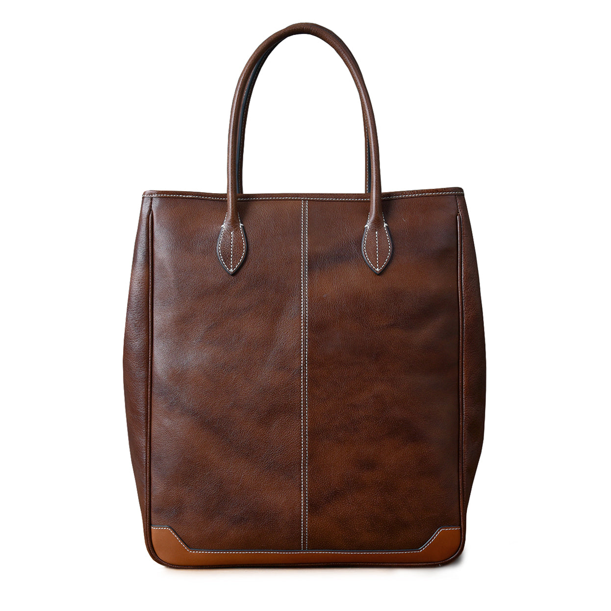 Large vertical cowhide tote bag in brown, top-grain leather, handcrafted, unisex design, height 16.5 inches.