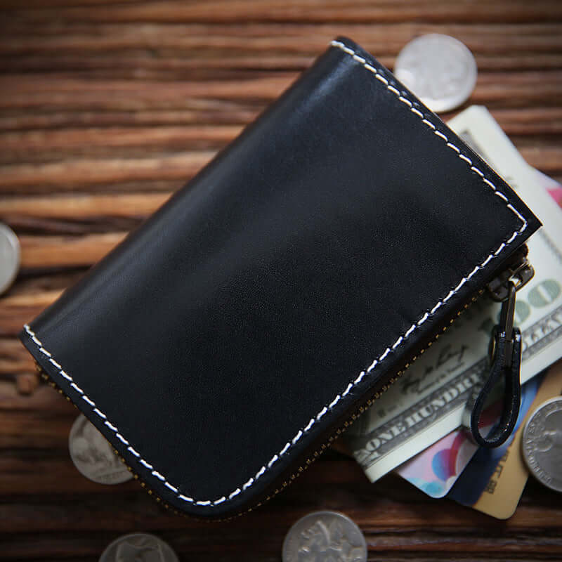 Full Grain Leather Short Wallet - Premium Cowhide Compact Purse with coins and cash on a wooden surface.
