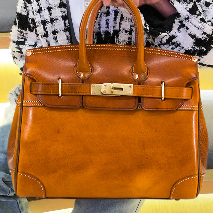 Leather Large Tote Bag, a classic brown handbag, featuring a stylish buckle, perfect for everyday use.