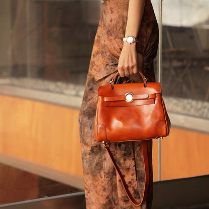 A woman holding a Classic Leather Bag with a stylish outfit, showcasing Italian craftsmanship and design.
