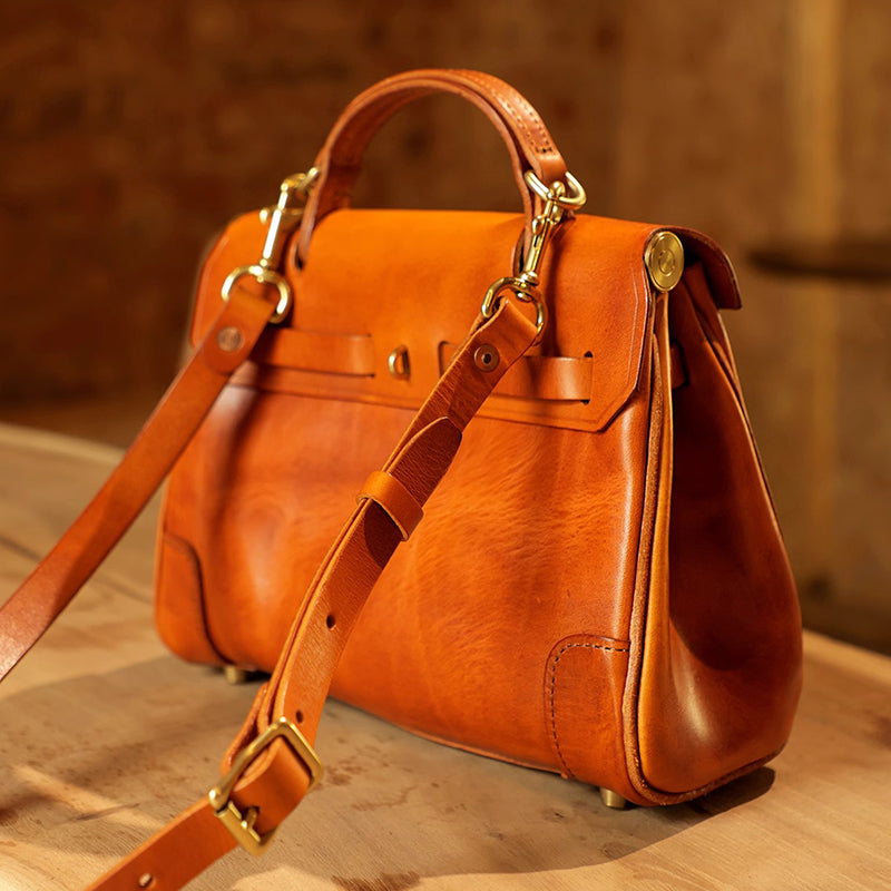 Classic Leather Bag with adjustable crossbody strap in rich brown Italian leather, showcasing its elegant design and craftsmanship.