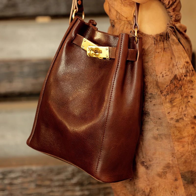 Italian Leather Bucket Bag Women in brown with gold hardware, perfect for stylish shoulder wear.