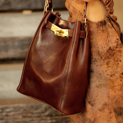 Italian Leather Bucket Bag Women in brown with gold hardware, perfect for stylish shoulder wear.