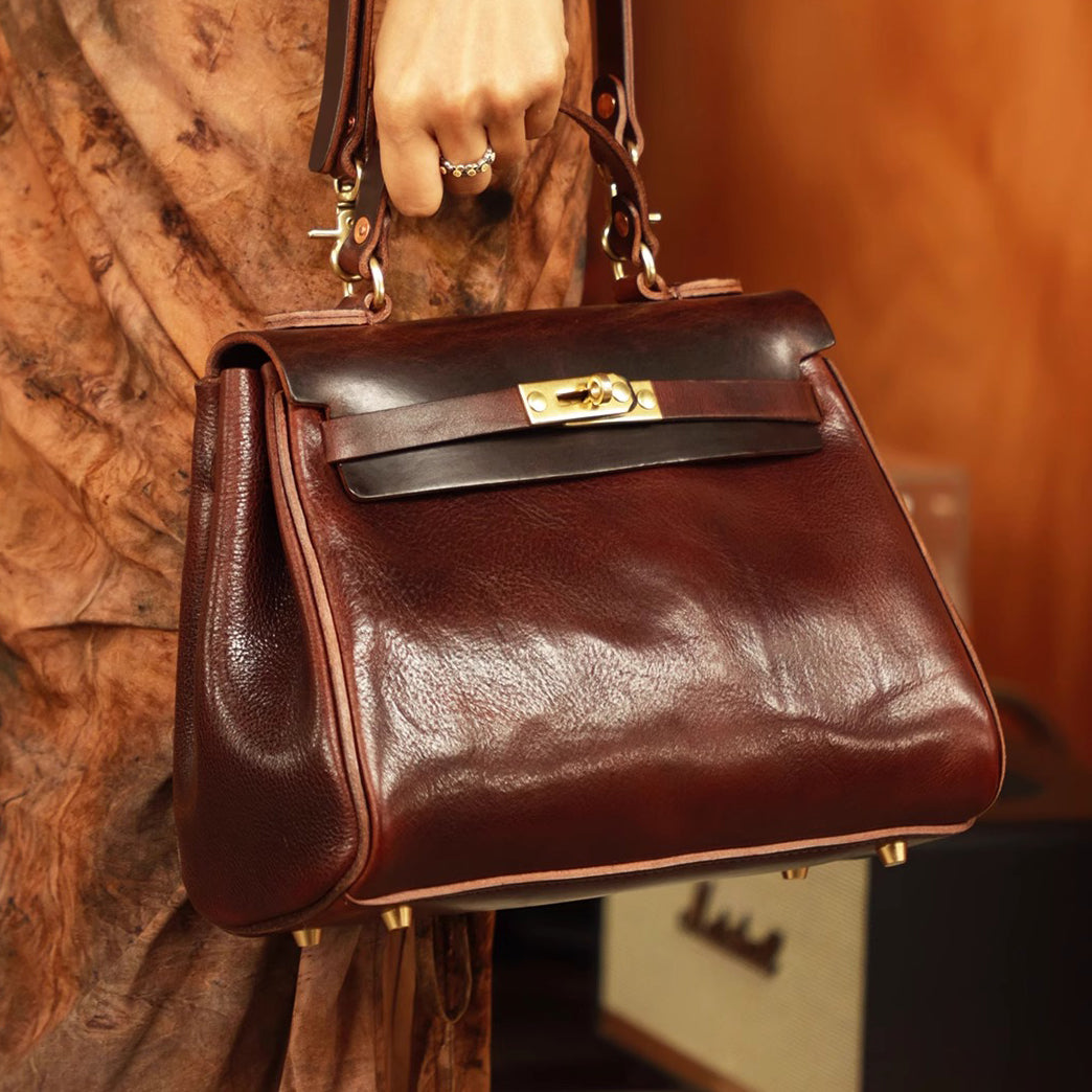 Handmade Italian Leather Tote Bag Women being carried, showcasing rich brown color and elegant design.