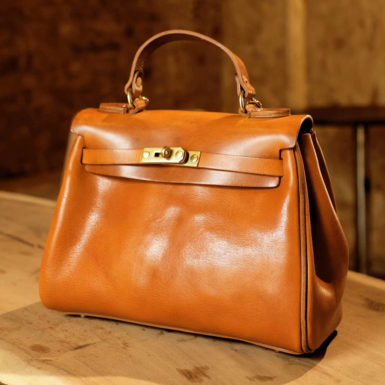 Italian Leather Tote Bag Women with sleek design, featuring a brown leather exterior and stylish clasp closure.
