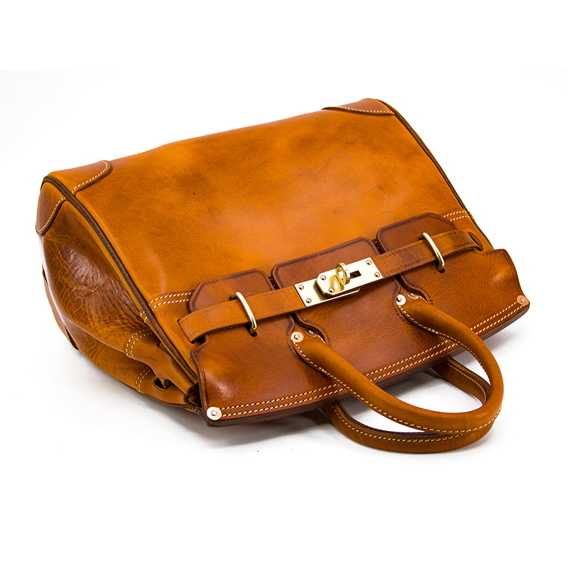Leather Large Tote Bag in a rich tan color showcasing elegant design and spacious interior.
