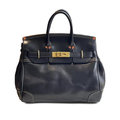 Leather Large Tote Bag in black with gold hardware and double handles, stylish and spacious for everyday use.