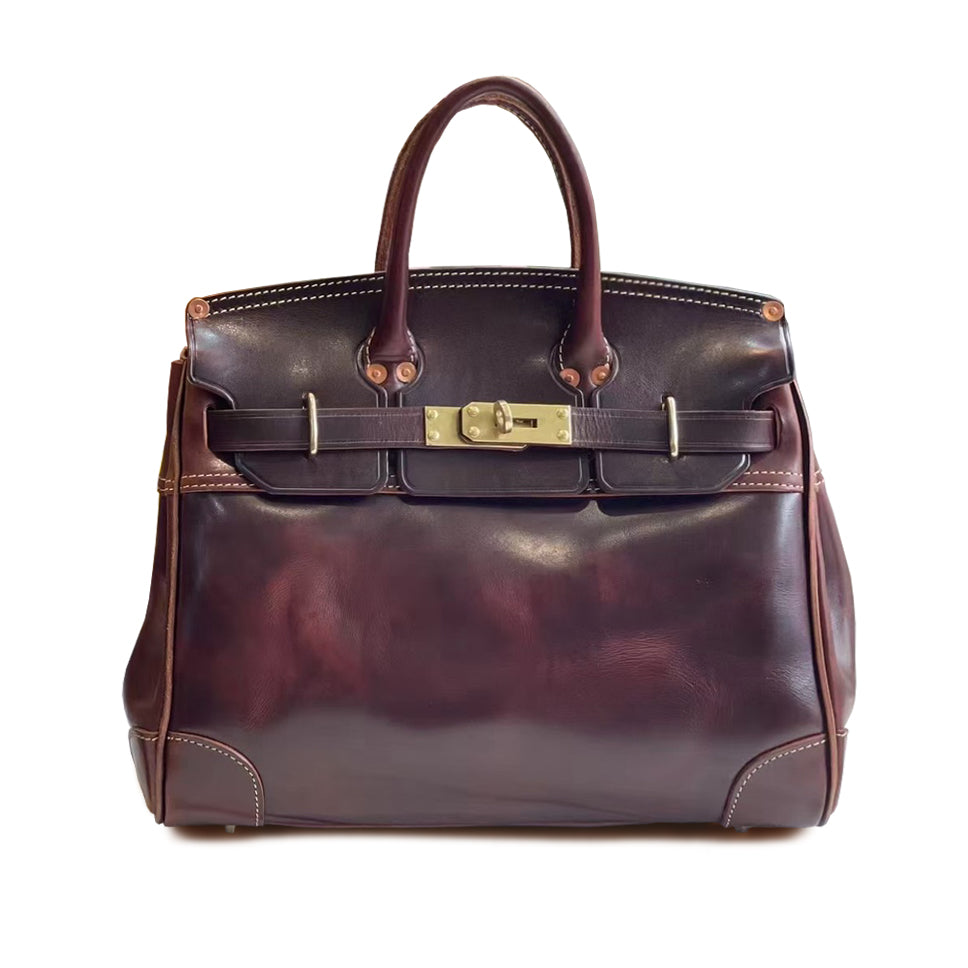 Leather Large Tote Bag featuring classic design, sturdy handles, and a stylish lock closure.