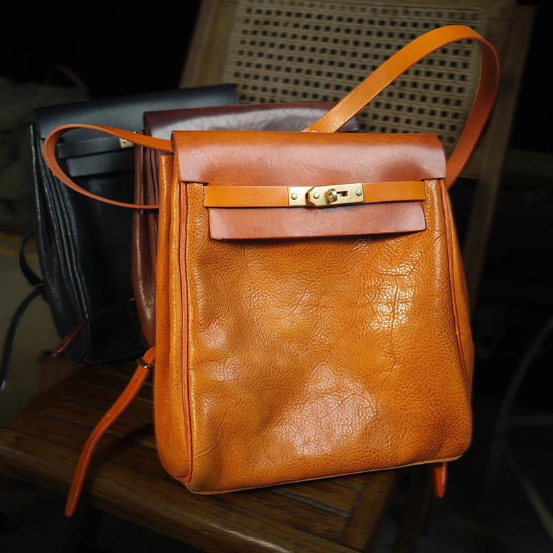 Vegetable tanned leather backpack in orange, showcasing stylish design and small size, perfect for women, Leather Backpack Women.