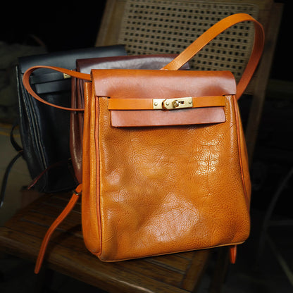 Vegetable tanned leather backpack in orange, showcasing stylish design and small size, perfect for women, Leather Backpack Women.