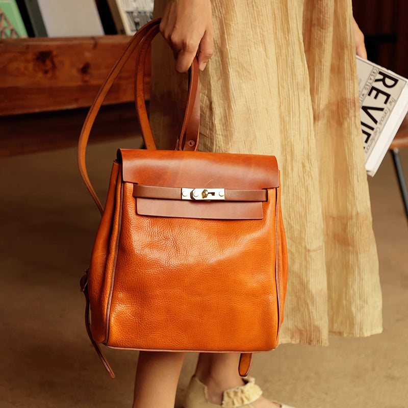 Leather Backpack Women stylish vegetable tanned leather backpack in orange, perfect for daily use and casual outings.