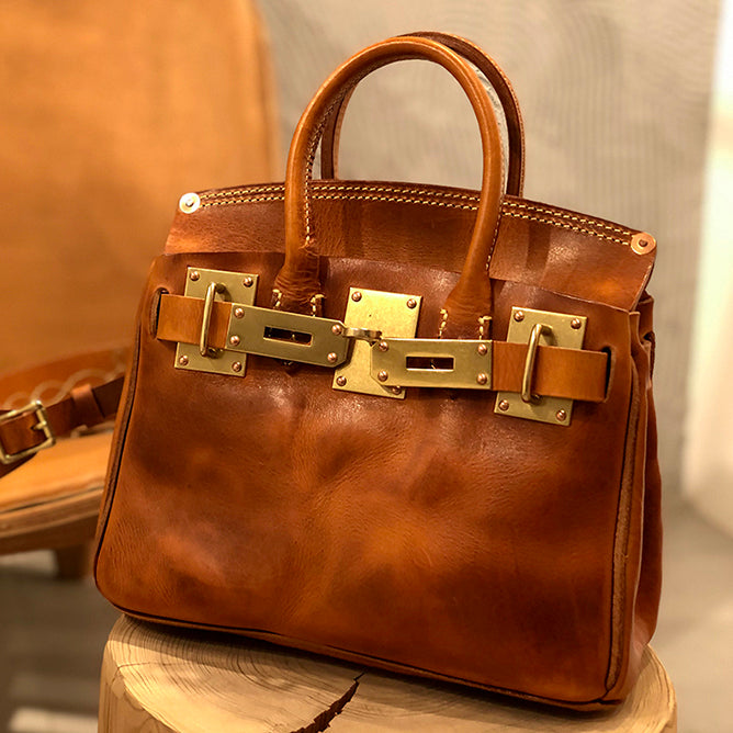 Handcrafted Italian Leather Crossbody Bag Women in tan color with gold hardware details.