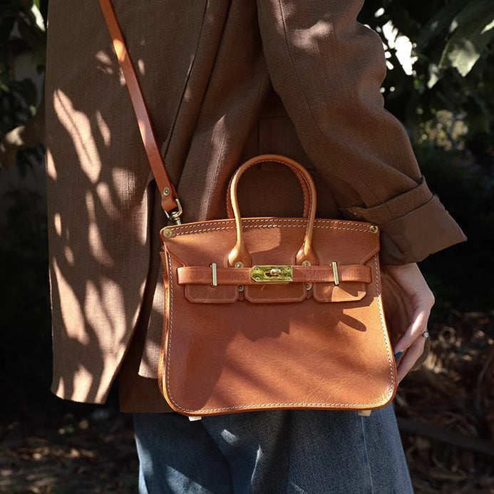 Classic Italian Leather Crossbody Bag Women displayed in earthy tones on a stylish model's shoulder.