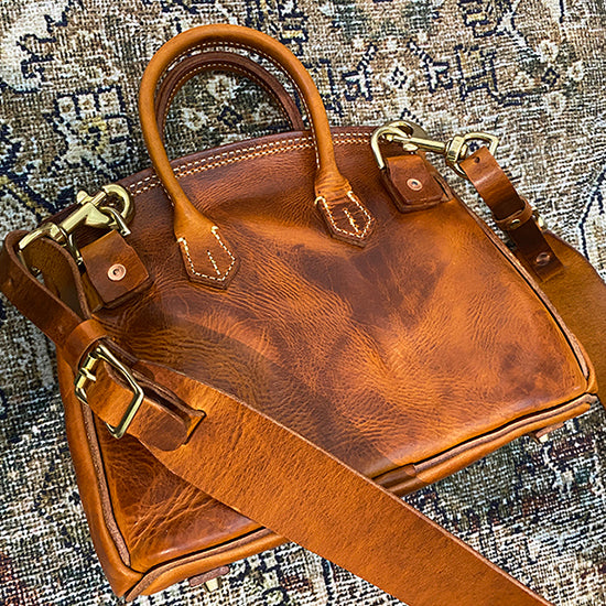 Handcrafted Italian Leather Crossbody Bag Women in warm brown, showcasing elegant design and practical size.