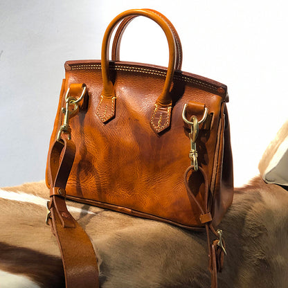 Handcrafted Italian Leather Crossbody Bag Women displayed on a fur background, showcasing its rich brown color and unique texture.