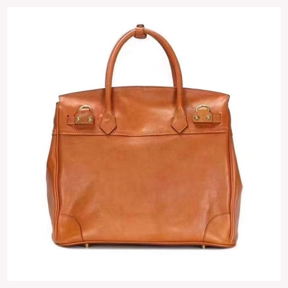 Genuine Leather Tote Bag Women in brown color, featuring sturdy handles and a spacious design.