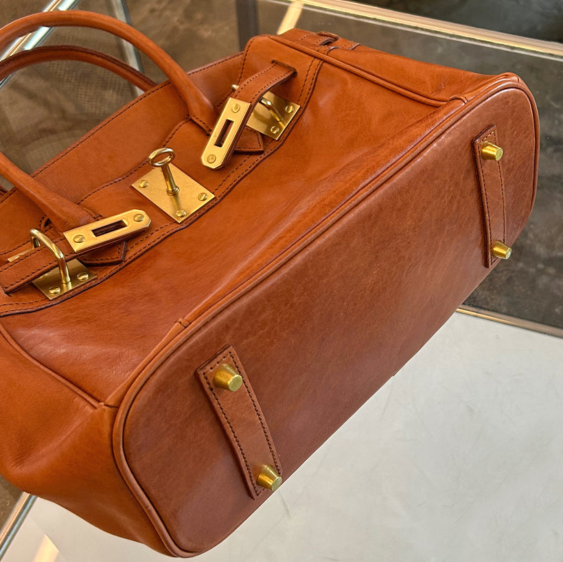 Genuine Leather Tote Bag Women showing the top view with golden accents and sturdy handles.