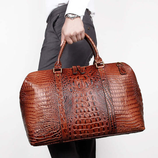 Genuine Leather Travel Bag Croc Embossed Business Duffel 18in held by a man in stylish attire.