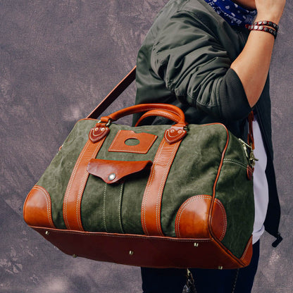 Canvas Duffle Bag Italian Leather Large Weekender Bag carried by a traveler showcasing its stylish design.