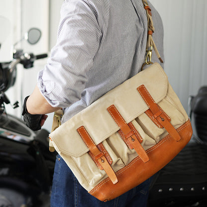 Canvas Leather Messenger Bag, 17.3in large crossbody satchel with vintage flap design, worn by a person.
