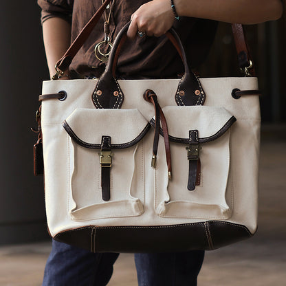 Large Canvas Leather Tote Bag with pockets, stylish vintage design, perfect for daily use and crossbody styling.