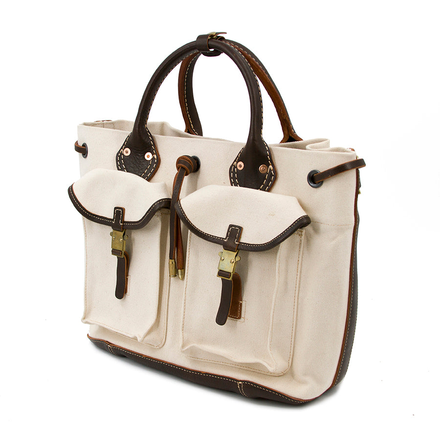 Large Canvas Leather Tote Bag featuring vintage design, double handles, and front pockets.