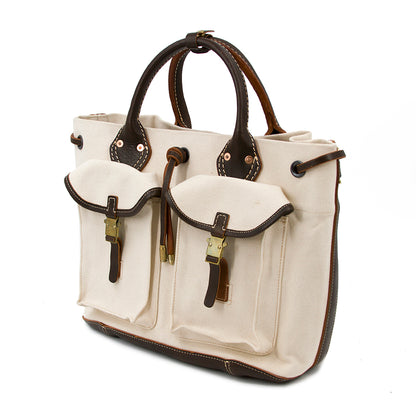 Large Canvas Leather Tote Bag featuring vintage design, double handles, and front pockets.