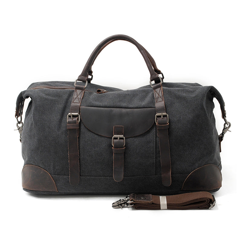 Canvas Leather Duffel Bag 21.7in Large Capacity Travel Luggage Men in dark gray with brown leather accents and shoulder strap.