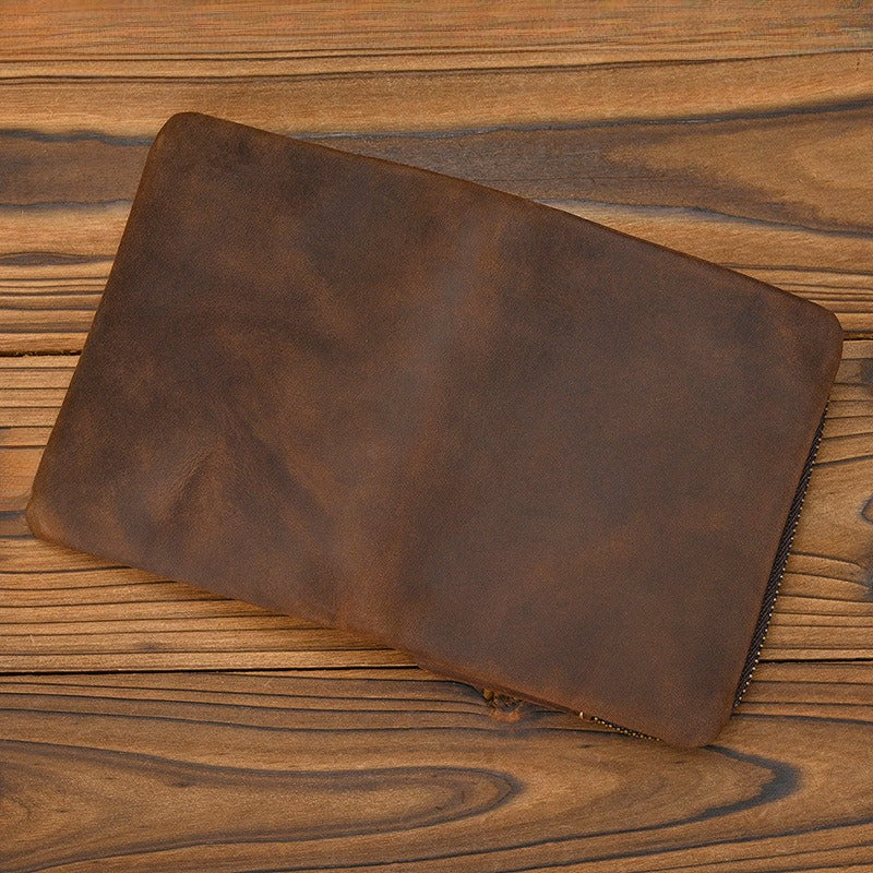 Crazy Horse Leather Bifold Wallet Men Zipper Coin Multi Card on wooden surface showcasing rich brown texture.