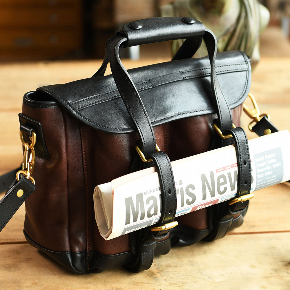 Italian Leather Messenger Bag 15.4in Cambridge Style Work Bag with rolled newspaper inside.
