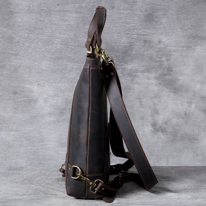 Side view of Full Grain Leather Backpack Tote 15in 3 Way Carry Laptop Bag Men with leather shoulder strap.