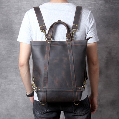 Full Grain Leather Backpack Tote 15in 3 Way Carry Laptop Bag Men shown from the back, highlighting its dark brown color and adjustable straps.