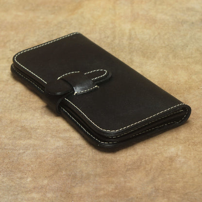 Full Grain Leather Long Wallet Hand Stitched Strap Clasp Clutch in black color on a textured background.