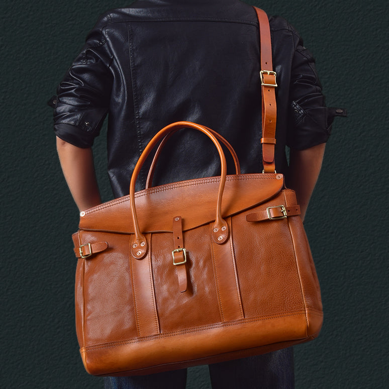 Italian Leather Travel Bag shown from behind, featuring dual handles and a shoulder strap, perfect for travel and daily use.
