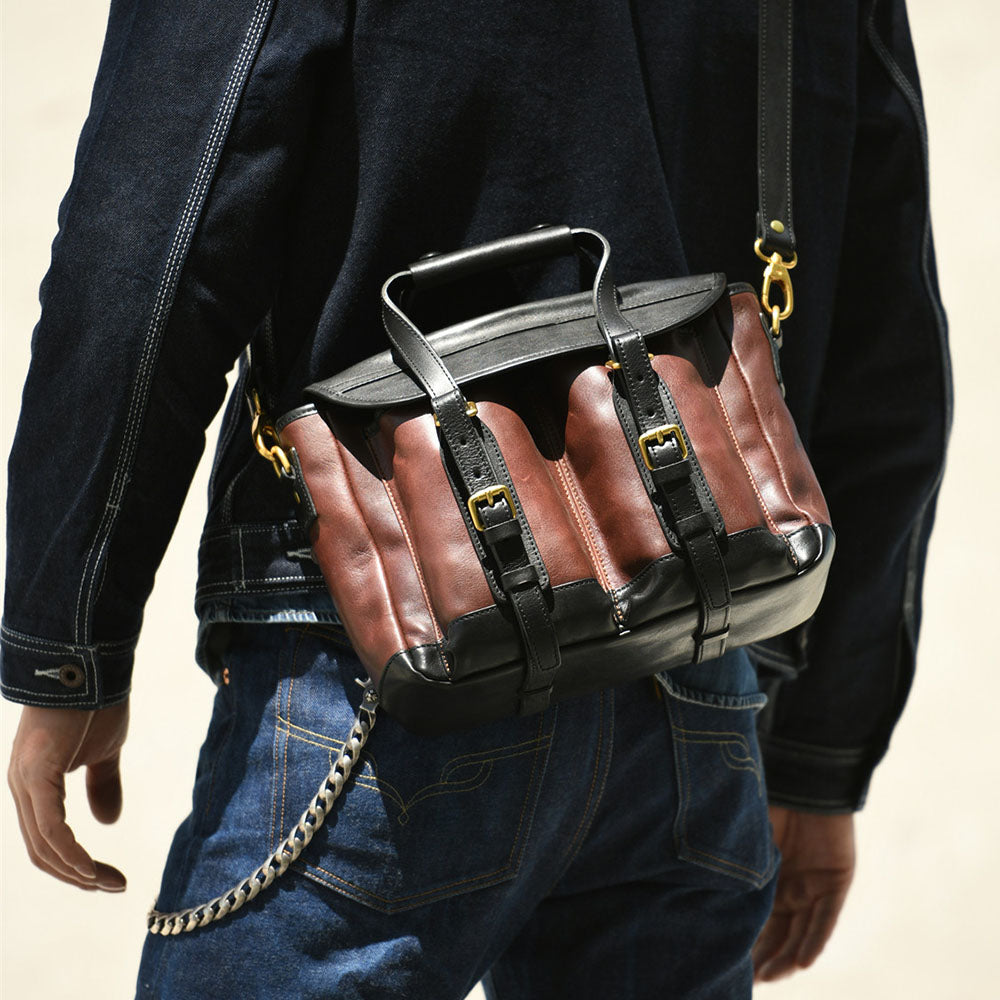 Italian Leather Messenger Bag 15.4in Cambridge Style Work Bag worn by a person, showcasing its stylish design.
