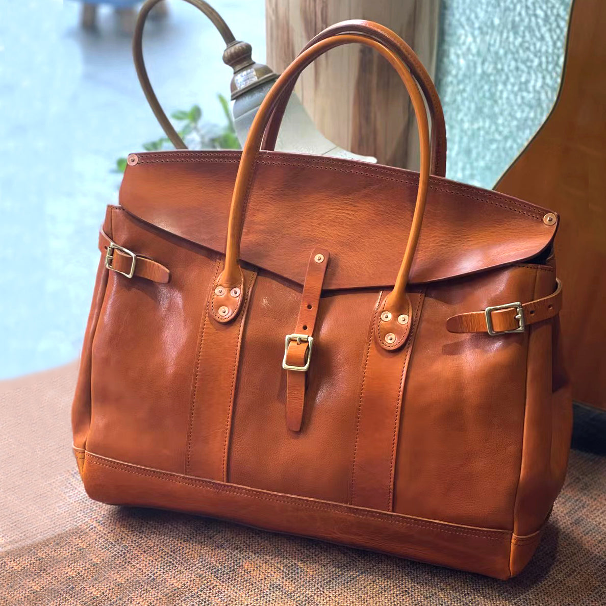 Italian Leather Travel Bag in rich brown color, designed as a large laptop tote and weekender briefcase.