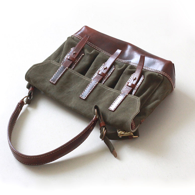 Canvas Leather Messenger Bag with adjustable straps and vintage design, perfect for everyday use.
